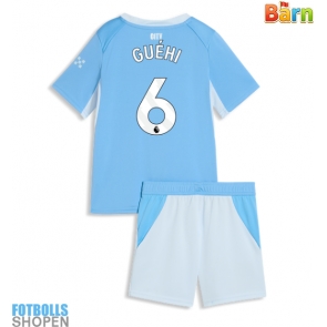 Billiga Manchester City Marc Guehi #6 Hemmatröja Barn 2026-27 Kortärmad (+ Korta byxor)
